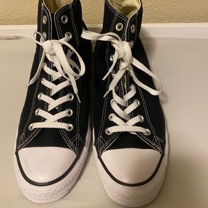 Men’s black high top Converse shoes